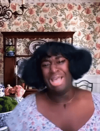 Woman With Wig Making Funny Face