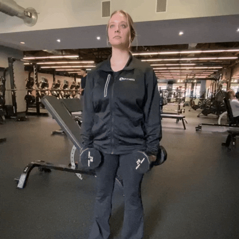 Woman Working Out Looks Like She Shrugs GIF