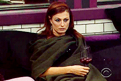 Woman Wrapped in Blanket Holding Wine Glass