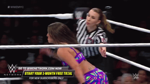 Woman Wrestling Ring With Go To Wnetwork.com Now GIF