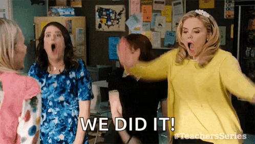 Women Celebrating in Classroom