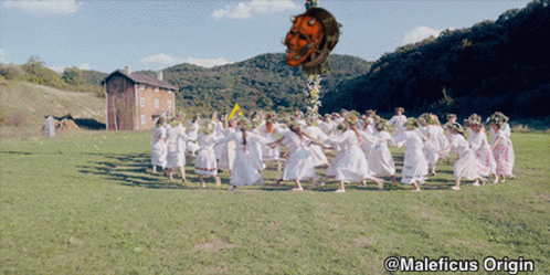 Women Dancing In Field With Maleficus Origin GIF