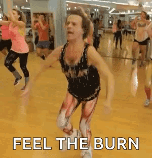Women Dancing in Gym With Muscle Suit