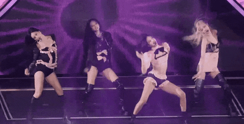 Women Dancing In Purple Light GIF