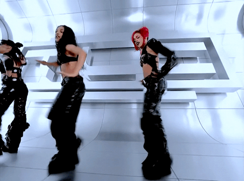 Women Dancing In Room With Letter E GIF