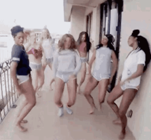 Women Dancing on Balcony