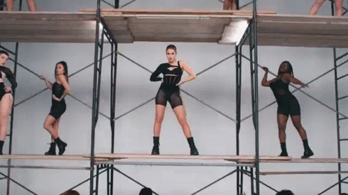 Women Dancing On Scaffolding GIF
