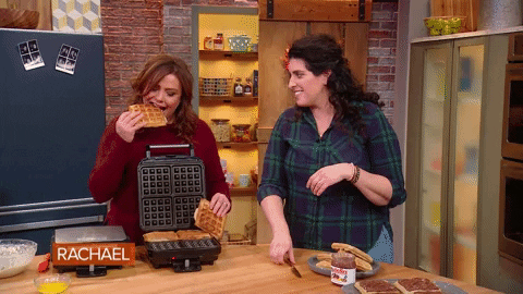 Women Eating Freshly Cooked Waffles GIF