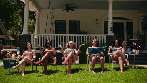 Women In Bikinis Sitting In Chairs GIF