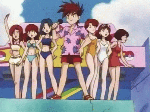 Women in Bikinis Standing Next to Man in Hawaiian Shirt Holding Microphone