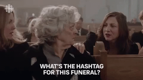 Women In Church Saying What's The Hashtag For This Funeral GIF