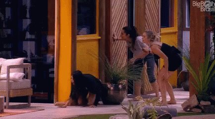 Women in Front of Big Brother Brasil Building