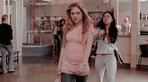 Women in Pink and Blue Shirts