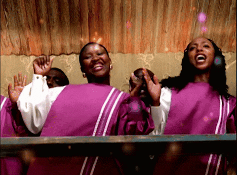 Women In Purple And White Robes Singing GIF