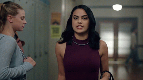 Women In Purple Tank Top In Hallway GIF