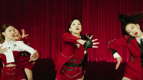 Women In Red Dresses Dancing GIF