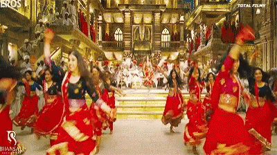 Women in Red Dresses Dancing