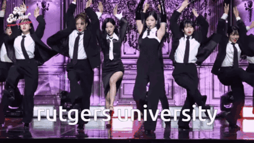 Women in Suits and Ties Dancing on Stage Rutgers University