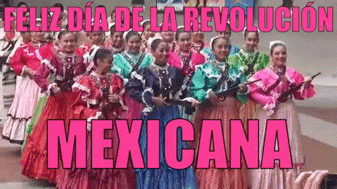 Women in Traditional Mexican Costumes Holding Guns