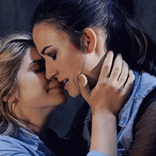 Women Kissing Forehead GIF