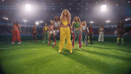 Women on Soccer Field One in Yellow Pants