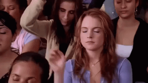 Women Sitting in a Row Eyes Closed