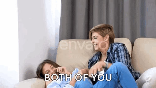 Women Sitting On Couch Laughing Baby GIF