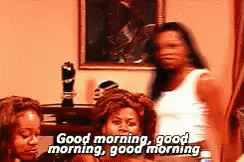 Women Standing In Room Saying Good Morning GIF