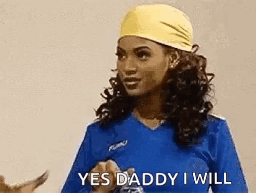 Women Talking Blue Shirt and Yellow Headband