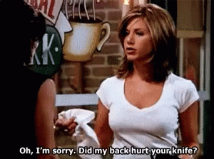 Women Talking In Front Of Brick Wall GIF