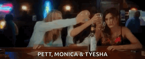 Women Toasting at Bar