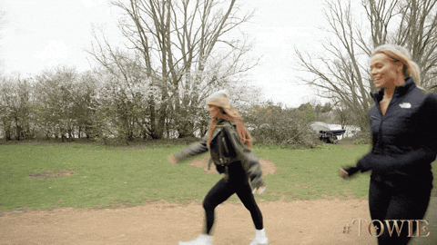 Women Walking Fast To Reach Finish Line GIF