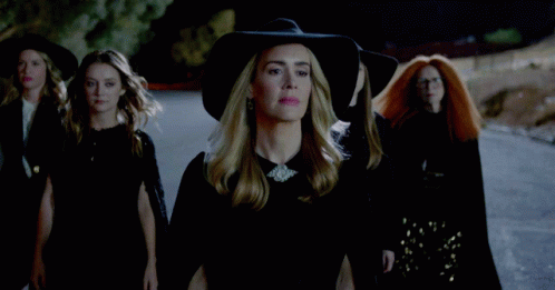 Women Walking One in Black Hat