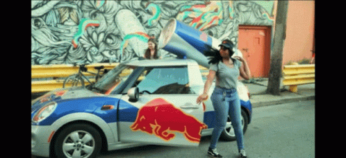 Women With Red Bull Backpacks GIF