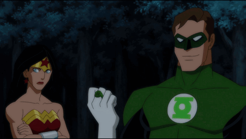 Wonder Woman And Green Lantern Looking At A Green Glowing Hand GIF