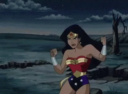 Wonder Woman Flexing Muscles in Front of Water