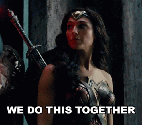 Wonder Woman Holding Sword and Shield Saying We Do This Together