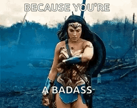 Wonder Woman Is Standing In The Middle Of A Field With A Shield And A Sword . GIF
