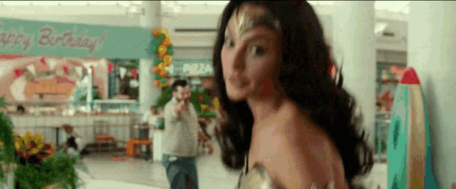 Wonder Woman Sliding A Kid GIF