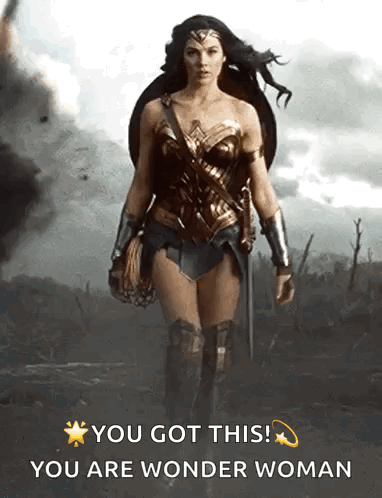 Wonder Woman Walking Through Field With Shield and Sword