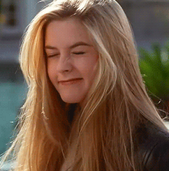 Wondering Alicia Silverstone Wink GIF