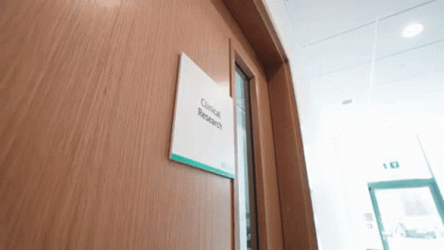 Wooden Door With Clinical Research Sign
