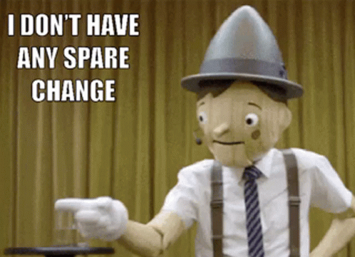 Wooden Puppet Pointing I Don't Have Any Spare Change