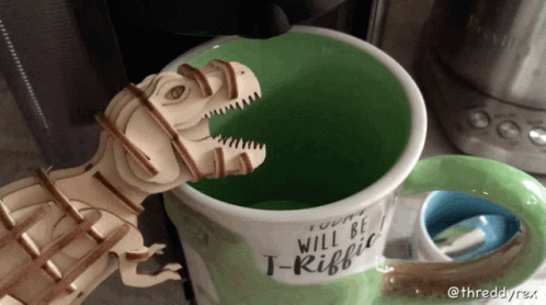 Wooden T-Rex Sticking Head Out of Coffee Mug Saying T-Rifff