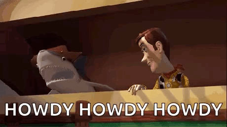Woody And A Stuffed Shark From Toy Story Are Standing Next To Each Other And Talking To Each Other . GIF