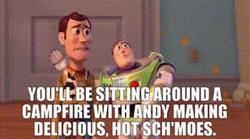 Woody And Buzz Lightyear Are Sitting Around A Campfire With Andy Making Delicious Hot Sch 'Moes . GIF
