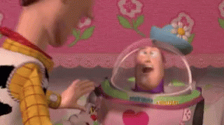 woody and buzz lightyear from toy story are standing next to each other in a room .