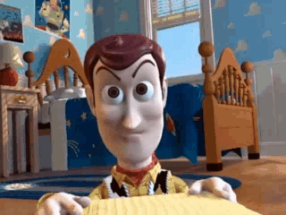 Woody from Toy Story Holding Paper