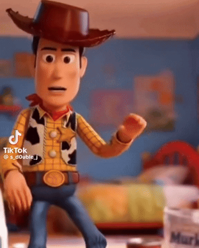 Woody From Toy Story Is Wearing A Cowboy Hat And Standing In A Room . GIF