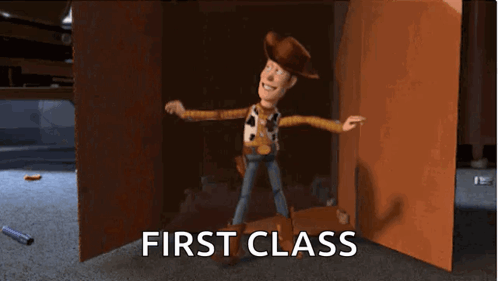 Woody From Toy Story Standing in Front of First Class Door